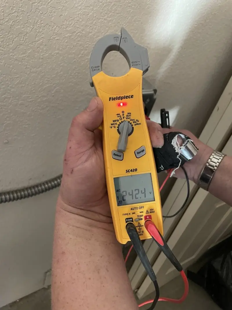 Voltage testing with clamp meter during Hot Tub / Pool Electrical Wiring in Langley Park